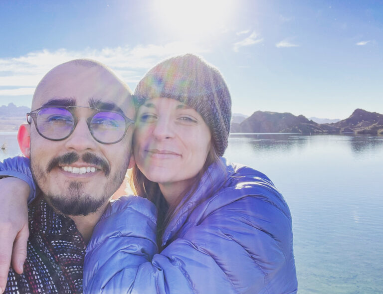 Megan Mendez with her husband Jaime posing for a picture together.