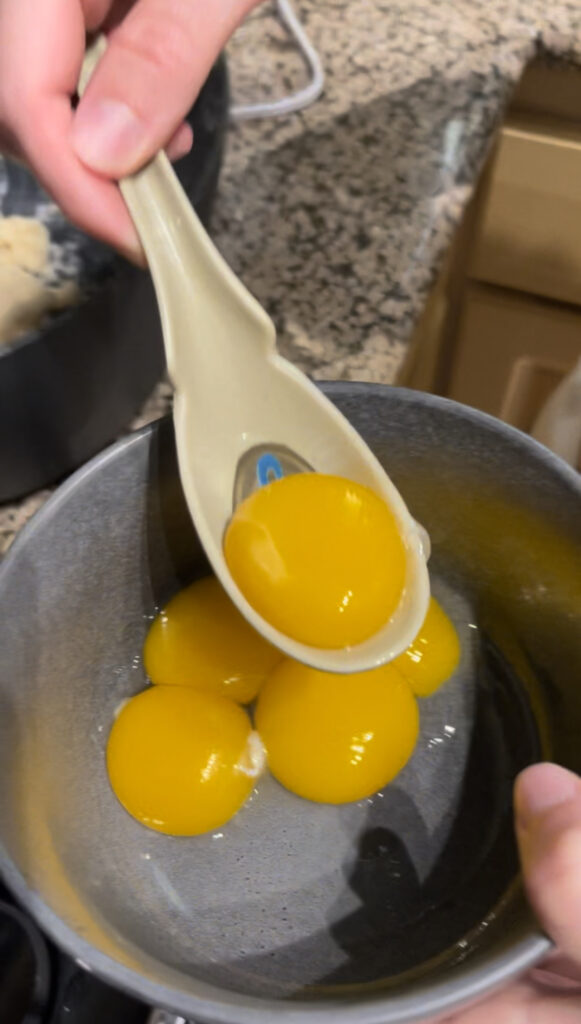 Separated egg yolks in a bowl.