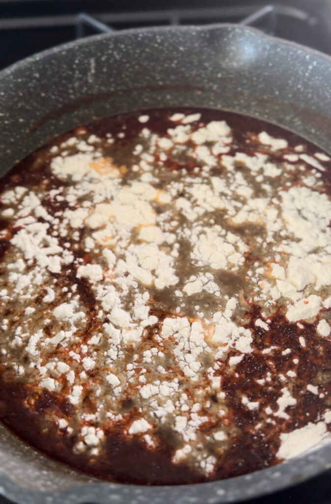 adding flour to the broth