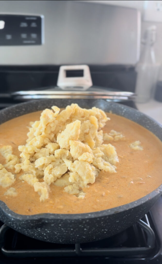 adding dumplings to the broth