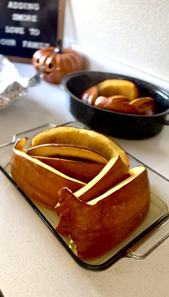 fully roasted pumpkin cooling off to finish making homemade pumpkin puree