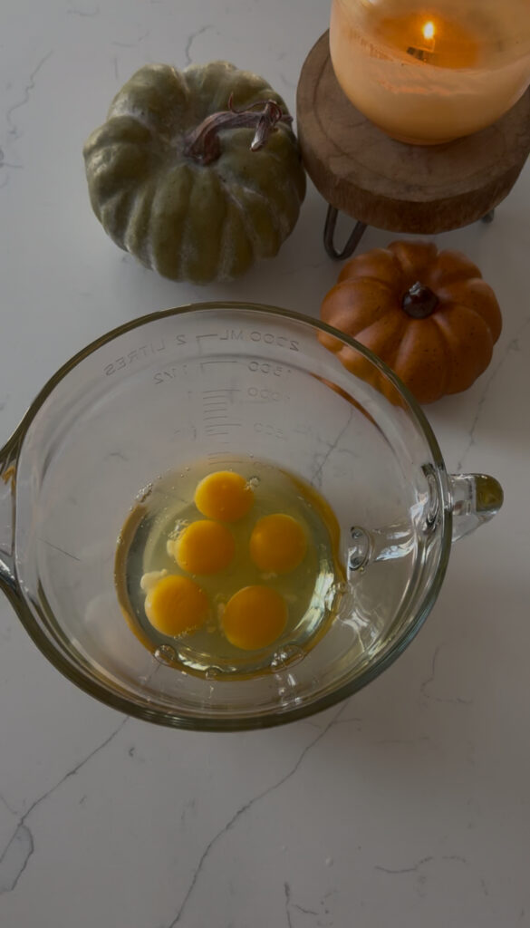 five eggs waiting to be whisked for flan