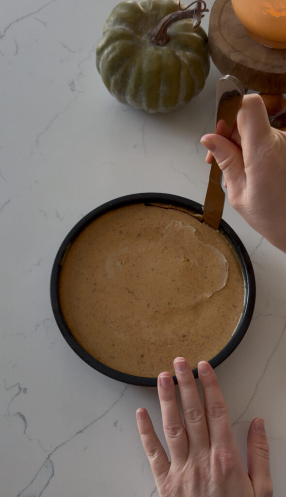 cutting around the edge of the flan pan