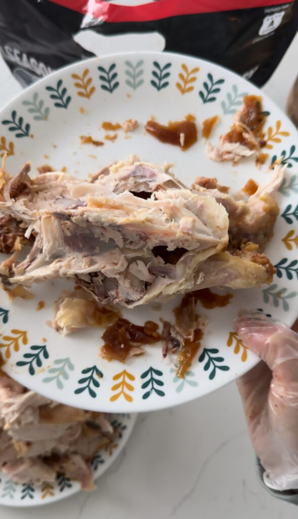The bones of a pulled-apart Costco chicken.