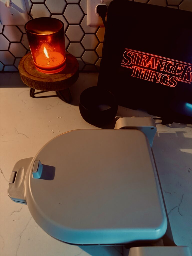 waffles cooking in waffle maker