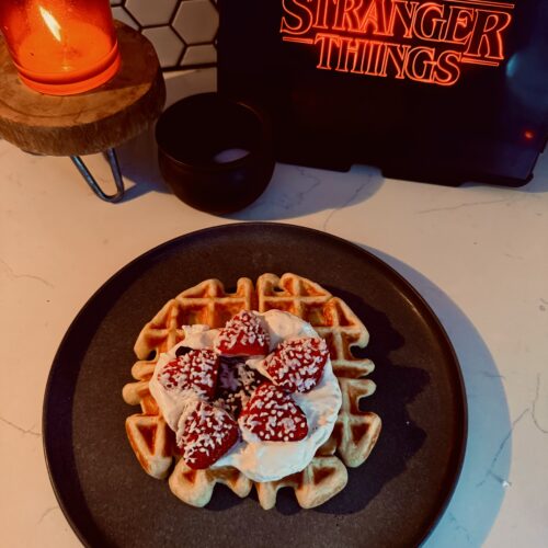 demogorgan waffles fully decorated with whipped cream and little demogorgan