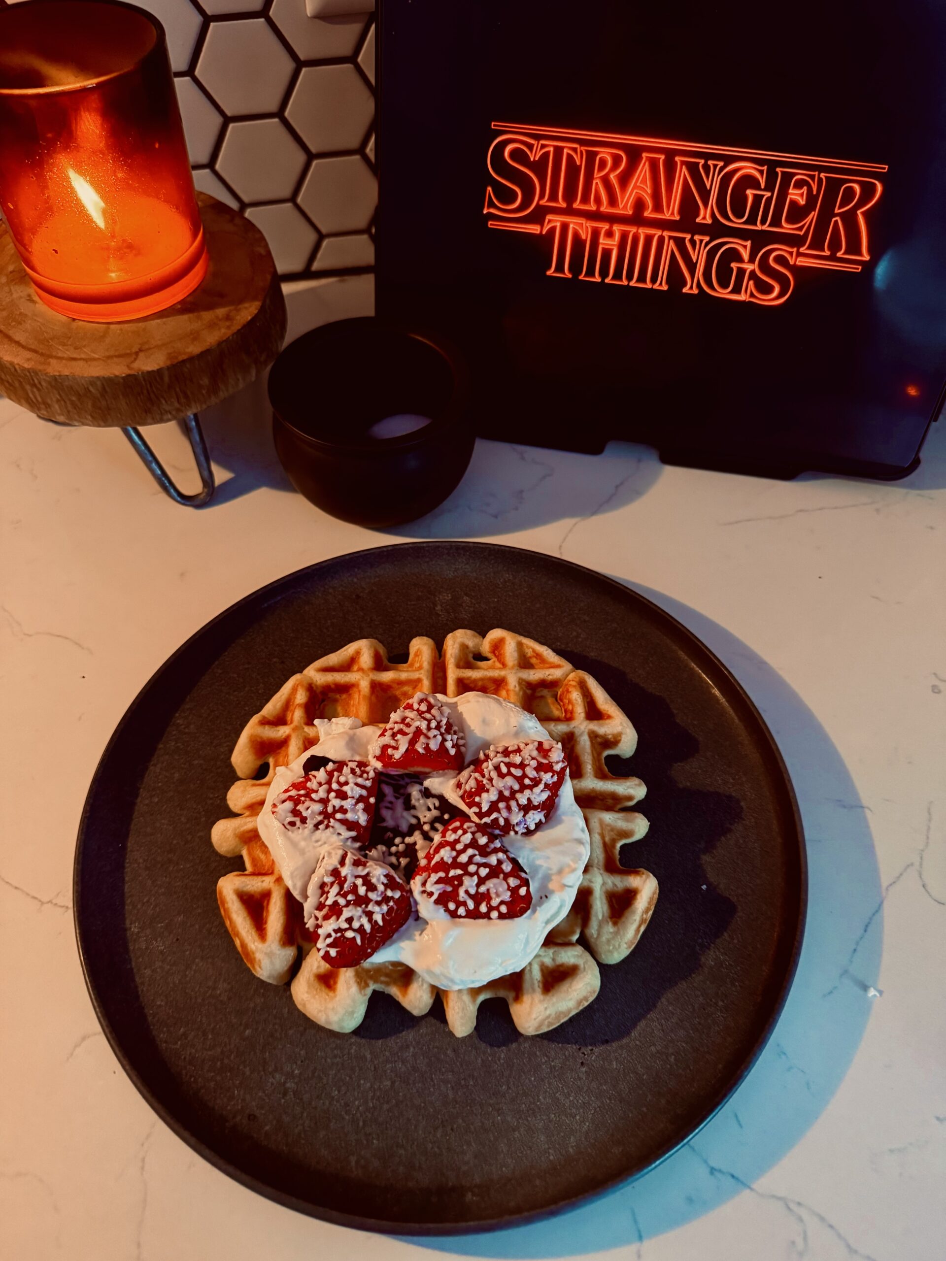 demogorgan waffles fully decorated with whipped cream and little demogorgan