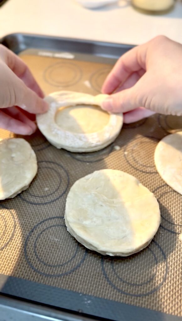 place the circle with the center on top of the one that does not.