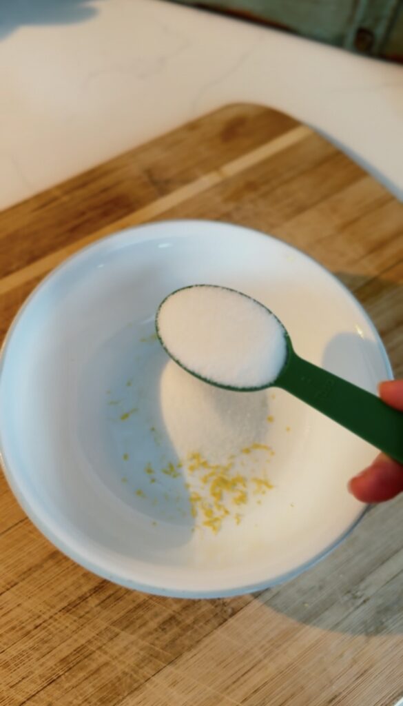lemon zest and sugar in a bowl