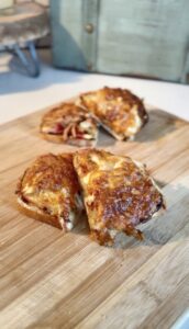 two slices of cheese toasty stacked on one another