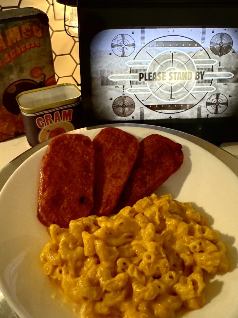 Mac and Cheese on a white plate with fried spam