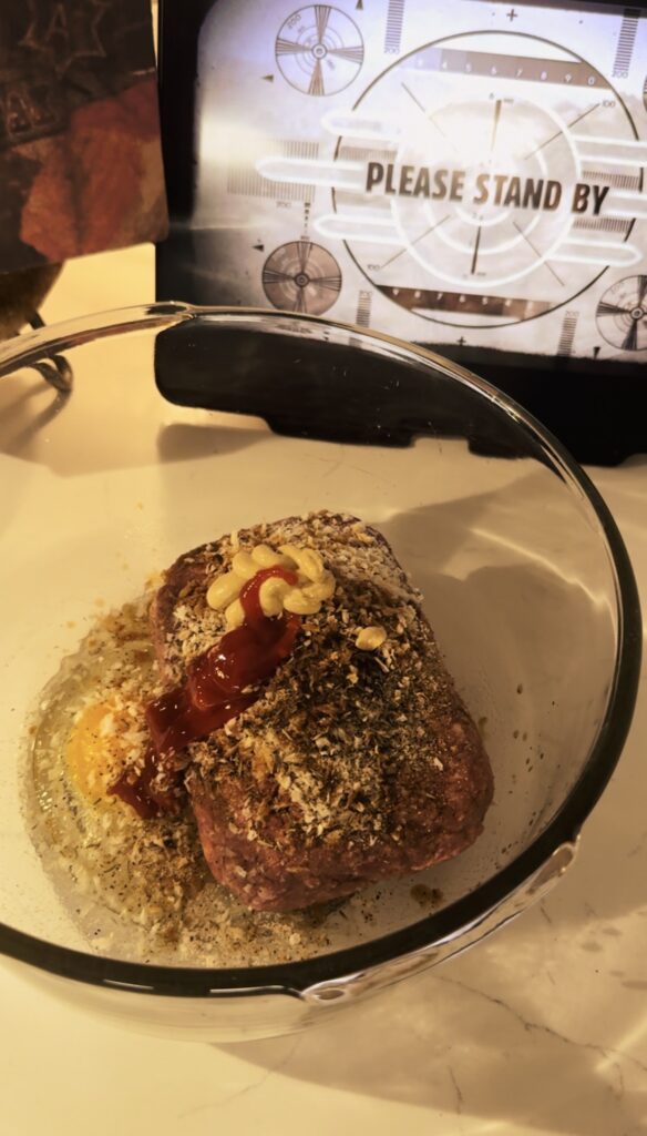 2 lbs ground beef with all the spices on top of it.